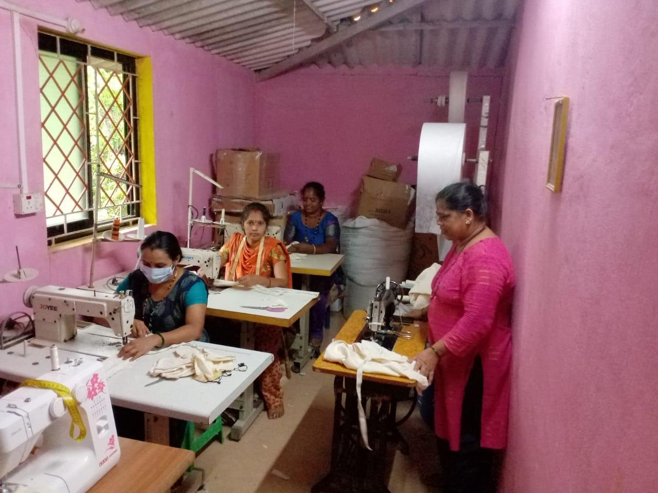 Women learning tailoring at a vocational training centre