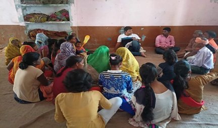 Women seated in a group during a training session in Delhi
