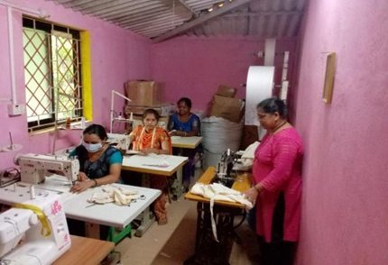 Women at sewing machines in the Goa livelihood centre