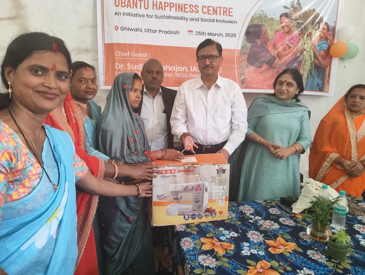 Dr Sudhir Mahajan and Ubantu Foundation staff presenting a sewing machine to a community member at the inauguration of the Ubantu Happiness Centre, Ghiwahi village, Sonbhadra
