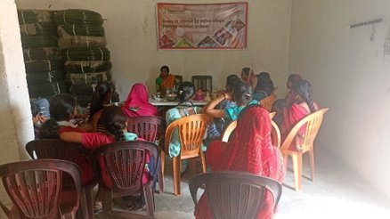 A group training session for women in a village hall in Uttar Pradesh