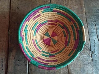 Close-up of a handwoven decorative plate made in Uttar Pradesh